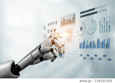 Futuristic robotic hand interacts with digital interface showcasing data visualization, graphs, and technological elements in a modern workspace environment Gantry 139335303