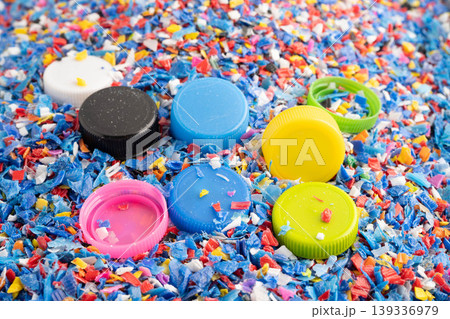 Bangkok, Thailand April 20, 2024 Plastic recycle pellets and caps for industrial use. Bangkok, Thailand April 20, 2024 Plastic recycle pellets and caps for industrial use. 139336979