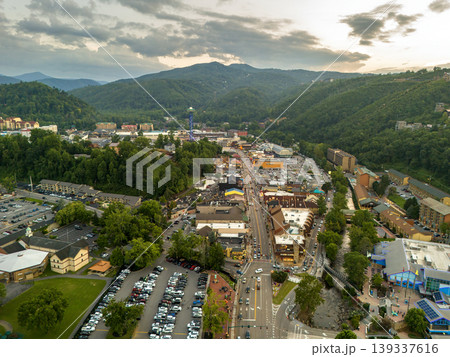 Aerial view of Gatlinburg, Tennessee with downtown hotels, restaurants and tourist shops along the Parkway street surrounded by Appalachian Mountains. 139337616