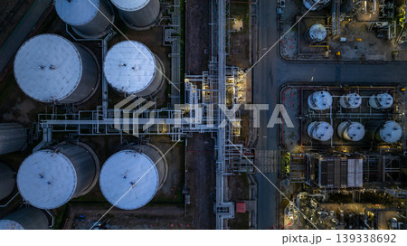 Aerial view oil storage tank and pipeline steel at night, Oil tank storage chemical petroleum petrochemical refinery product, Oil transportation system pipeline steel at oil refinery industry Aerial view oil storage tank and pipeline steel at night, Oil tank storage chemical petroleum petrochemical refinery product, Oil transportation system pipeline steel at oil refinery industry 139338692
