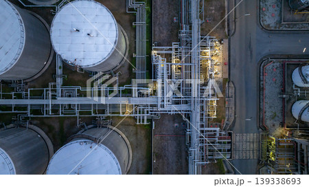 Aerial view oil storage tank and pipeline steel at night, Oil tank storage chemical petroleum petrochemical refinery product, Oil transportation system pipeline steel at oil refinery industry 139338693