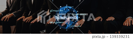 Hands of business people in suits with compliance, law, and regulation icons concept for teamwork and responsibility in corporate governance and ethics Trope 139339231