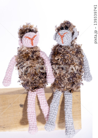 Crocheted sheeps toy on a white background 139339741