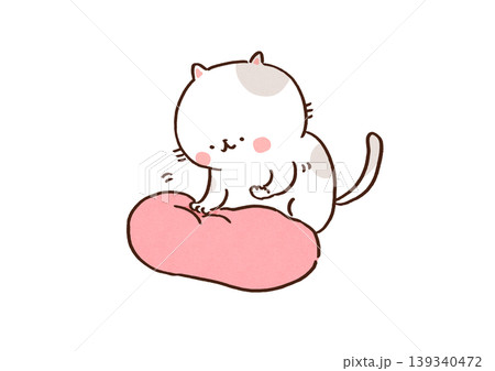 柔らかいピンク色のクッションを前足でふみふみする可愛い猫 139340472