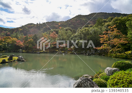 The garden scene of Tenryuji Temple at autumn. Famous temple in Japan. Tenryuji Temple is a Japanese traditional temples in Kyoto. Autumn and garden view. Nature and Travel concept. 139340535