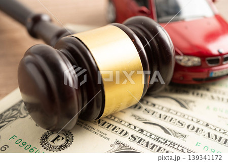 Bangkok, Thailand November 18, 2023 Car on banknote money, buying or insurance concept. Bangkok, Thailand November 18, 2023 Car on banknote money, buying or insurance concept. 139341172