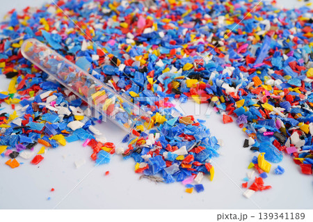 Plastic colorful pieces recycling shredded for industrial use. Plastic colorful pieces recycling shredded for industrial use. 139341189