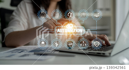 Business Professional Engaging with Automation Interface on Laptop in Modern Office Setting for Enhanced Efficiency and Productivity in Workflow Operations Fluxor 139342561