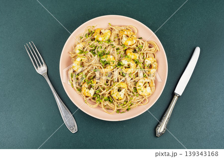 Creamy shrimp pasta with spaghetti and herbs Creamy shrimp pasta with spaghetti and herbs 139343168