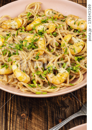 Creamy shrimp pasta with spaghetti and herbs Creamy shrimp pasta with spaghetti and herbs 139343169