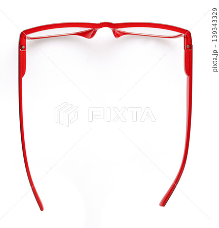 Red eyeglasses on white background from above Red eyeglasses on white background from above 139343329