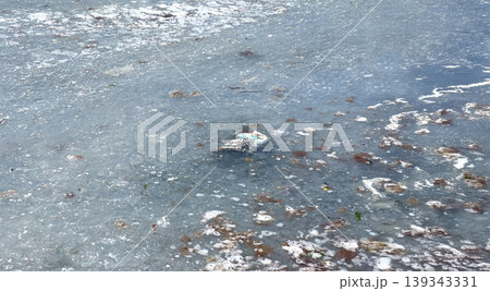 Water pollution creating environmental issue with floating debris 139343331