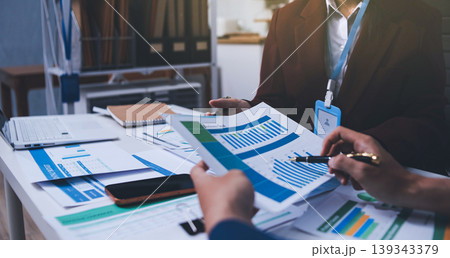 Accounting company provide finance and taxation planning for profitable cash flow, Auditor and accountant team working in office, analyze financial data and accounting record with calculator Accounting company provide finance and taxation planning for profitable cash flow, Auditor and accountant team working in office, analyze financial data and accounting record with calculator 139343379