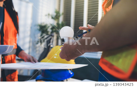 Concept Architect and desk of Architectural project in construction site or office building with mining light 139343425