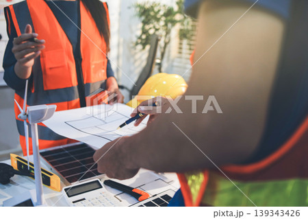 Concept Architect and desk of Architectural project in construction site or office building with mining light Concept Architect and desk of Architectural project in construction site or office building with mining light 139343426