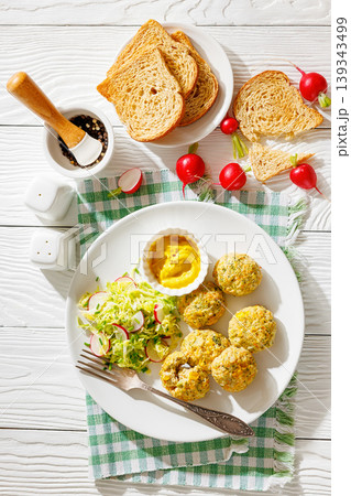 Baked meat and vegetable polpette with salad Baked meat and vegetable polpette with salad 139343499