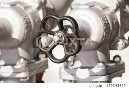 Industrial metal handwheel valve controlling flow system 139343555