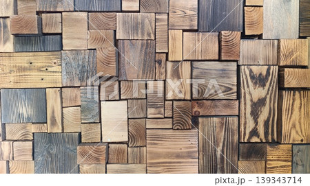 Rustic style wall with patterned wood panels 139343714