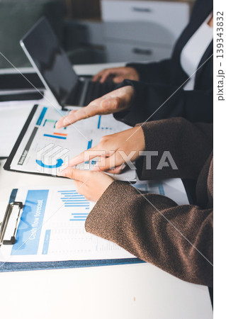 Accountants processing financial documents and taxes, managing corporate finance in a modern office. Audit and taxes in business 139343832