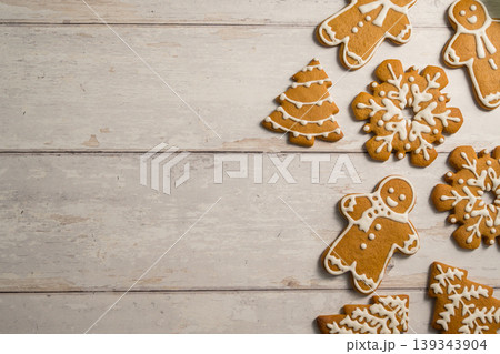 Holiday background. Christmas gingerbread cookies with icing flat lay, festive food, copy space Holiday background. Christmas gingerbread cookies with icing flat lay, festive food, copy space 139343904