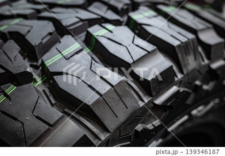 Black tire tread texture background with detailed rubber pattern. 139346187