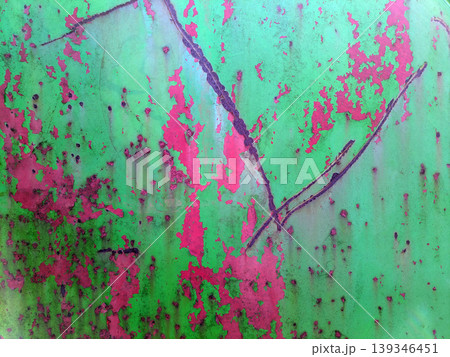 Close up of aged distressed chipped rusted paint work on a wall in green and red Close up of aged distressed chipped rusted paint work on a wall in green and red 139346451