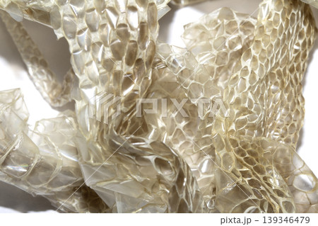 Close up of shedded snake skin snakeskin textured reptile background Close up of shedded snake skin snakeskin textured reptile background 139346479