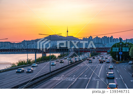 Seoul, South Korea - Apr. 24, 2026 : Sunset Cityscape of Seoul with N Seoul Tower, Seongsu Bridge and Busy Traffic on Gangbyeonbukro Highway 139346731