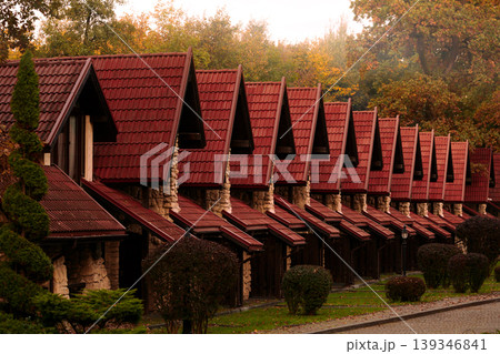dramatic living building cottage line street red tile roofs perspective background dramatic living building cottage line street red tile roofs perspective background 139346841