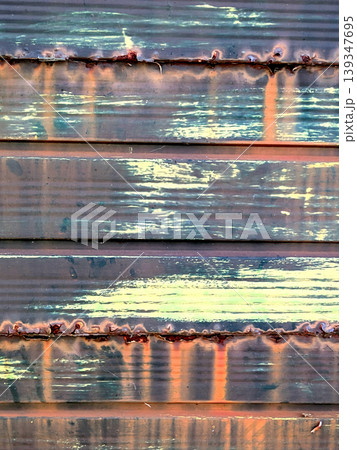 Lined rusted and painted weathered metal background patina Lined rusted and painted weathered metal background patina 139347695