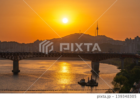 Seoul, South Korea - Apr. 24, 2026 : Sunset Cityscape of Seoul with N Seoul Tower, Seongsu Bridge and Busy Traffic on Gangbyeonbukro Highway Seoul, South Korea - Apr. 24, 2026 : Sunset Cityscape of Seoul with N Seoul Tower, Seongsu Bridge and Busy Traffic on Gangbyeonbukro Highway 139348305