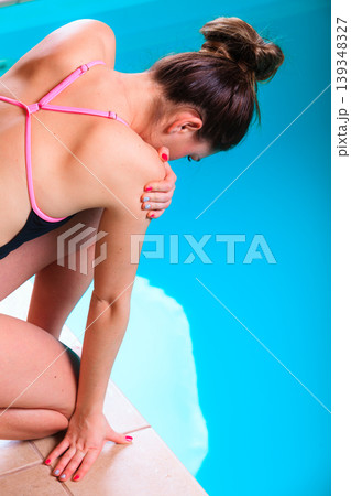 Girl swimmer preparing to  jumping and diving 139348327