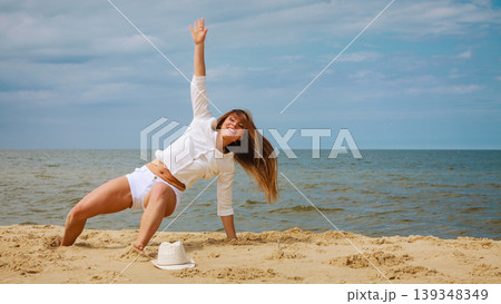 Happy woman on summer beach. Happy woman on summer beach. 139348349