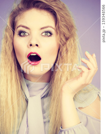 Woman having shocked amazed face expression Woman having shocked amazed face expression 139348566