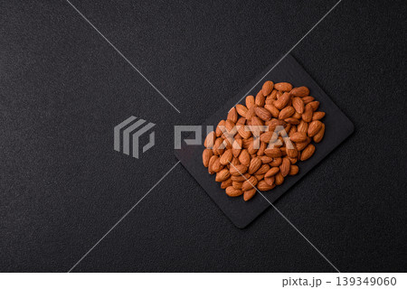 Raw and peeled almonds as a healthy food ingredient. Almonds as a food background Raw and peeled almonds as a healthy food ingredient. Almonds as a food background 139349060