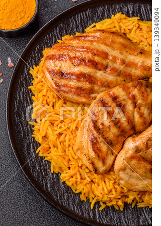 Kabsa or haneeth, an Arabic dish with rice and chicken, salt, and spices. Kabsa or haneeth Kabsa or haneeth, an Arabic dish with rice and chicken, salt, and spices. Kabsa or haneeth 139349094