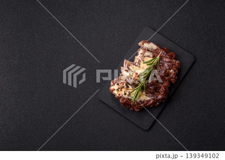Steak, beef or pork meat grilled or barbecued with salt and spices. Beef steak 139349102