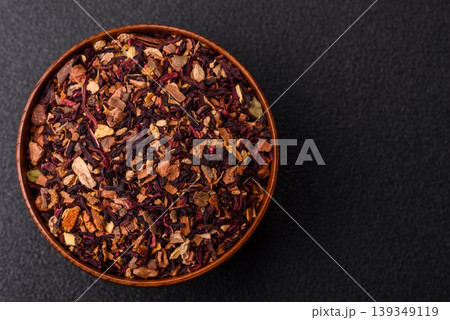 Dry herbal or fruit tea with flower petals and aromatic additives. Dry fruit herbal tea Dry herbal or fruit tea with flower petals and aromatic additives. Dry fruit herbal tea 139349119