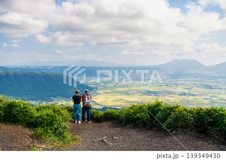 Japanese couple view mount Aso from Daikanbo observatory, Kumamoto 139349430