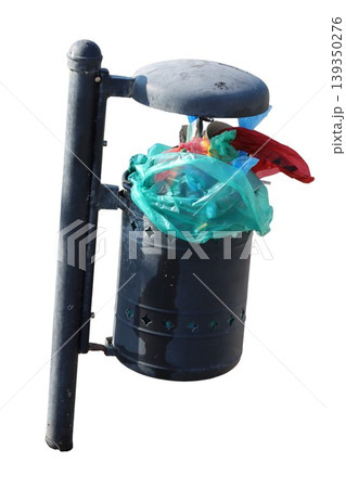 Overflowing public waste bin full of garbage Overflowing public waste bin full of garbage 139350276