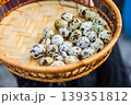 Basket full of speckled quail eggs, a natural and healthy food source 139351812