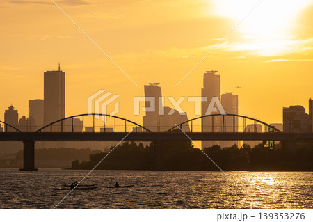 Golden sunset over Dongjak Bridge and Yeouido skyline at Han River, Seoul, South Korea Golden sunset over Dongjak Bridge and Yeouido skyline at Han River, Seoul, South Korea 139353276