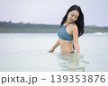 宮古島の海に入る水着姿の女性　旅行イメージ 139353876