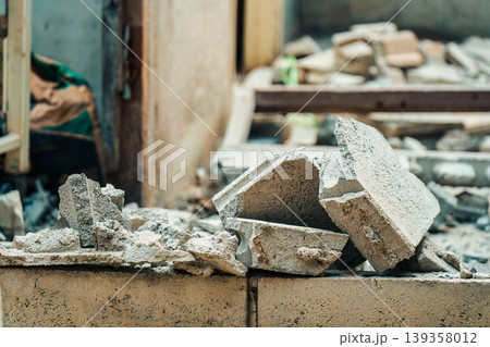 Demolished debris broken concrete and brick in abandoned construction site 139358012