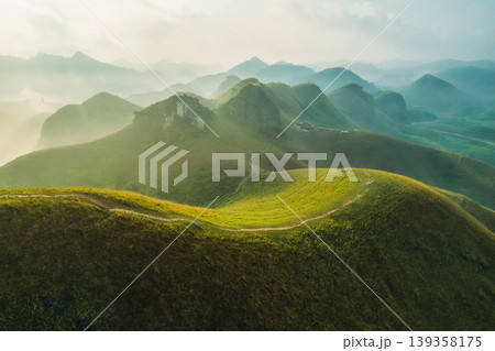 Scenery of Ba Guang grass hill, Mountain range with fog on the mountain in the morning 139358175