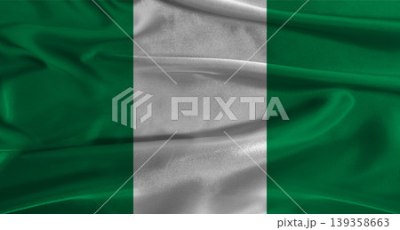 Flag of Nigeria with fabric textured background. Close up of National flag of Nigeria with realistic texture Flag of Nigeria with fabric textured background. Close up of National flag of Nigeria with realistic texture 139358663