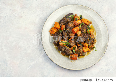 Slow cooked beef stew Slow cooked beef stew 139358779