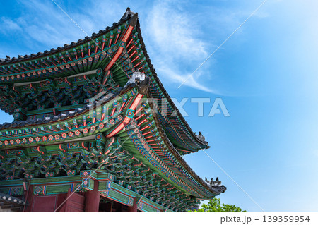 Seoul, South Korea - Apr. 18, 2026 : Gwanghwamun Gate with traditional Korean colorful roof and blue sky in Seoul, South Korea Seoul, South Korea - Apr. 18, 2026 : Gwanghwamun Gate with traditional Korean colorful roof and blue sky in Seoul, South Korea 139359954