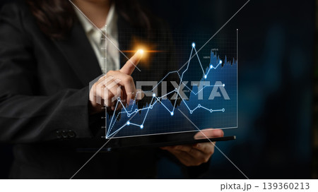 Businessman in Suit Touching Transparent Digital Graph Display, Modern Technology Interaction, Data Analytics, Financial Growth Concept Scalp 139360213