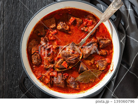 Beef goulash stew with paprika in ceramic pot Beef goulash stew with paprika in ceramic pot 139360796